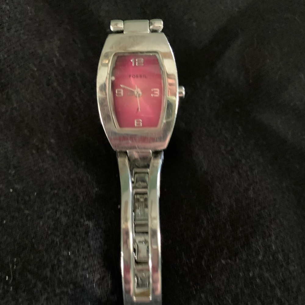 Pink face fossil watch